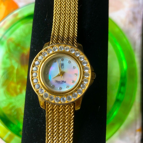 Victoria Wieck Crystal Watch Gold ToneMother of pearl face. Needs battery good C - Picture 1 of 7